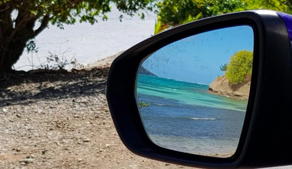 "Quand, buzy... je regarde dans mon rétroviseur en...Martinique"